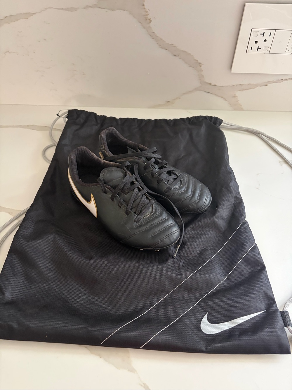 Kids Nike Tiempo Rio III FG soccer cleats with gold-tipped studs